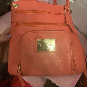 Coral Nicole Miller crossbody bag